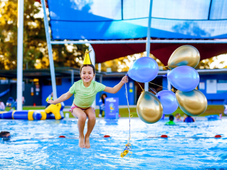 Child jumping into the pool