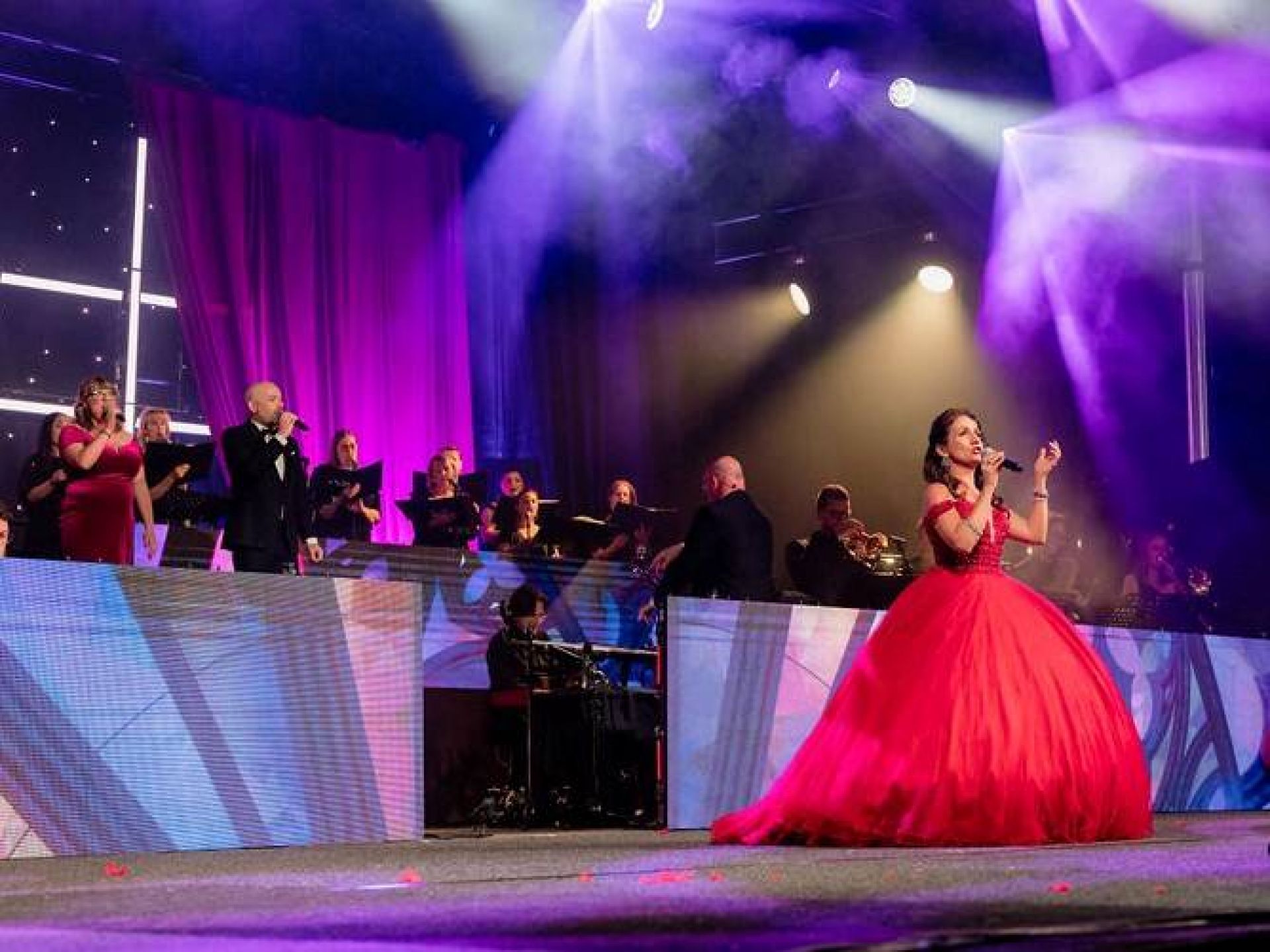 Michaela Burger singing on stage