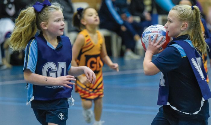 Young girls playing netball