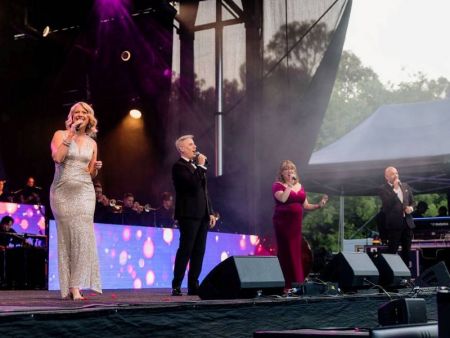 Four singers on stage