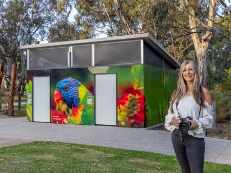 Toilet block wrapped in a photo of a parrot