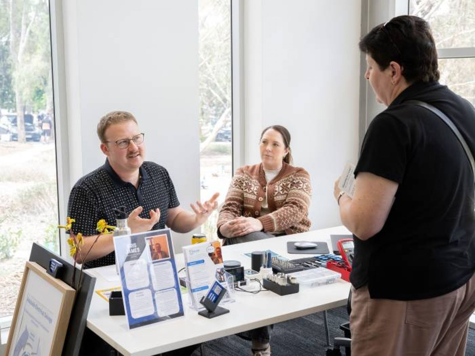 Person talking to a customer 