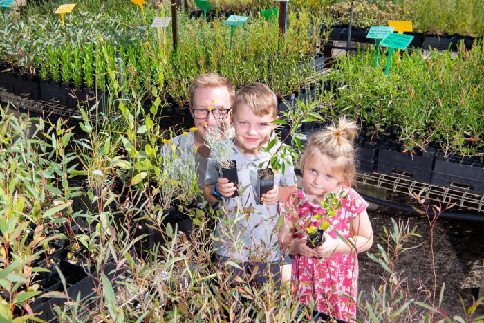 Family at a plant nursery