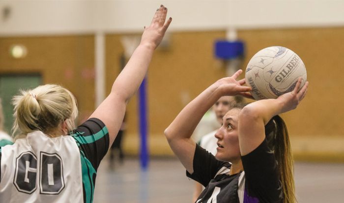 Ladies playing netball