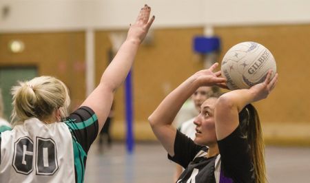 Ladies playing netball