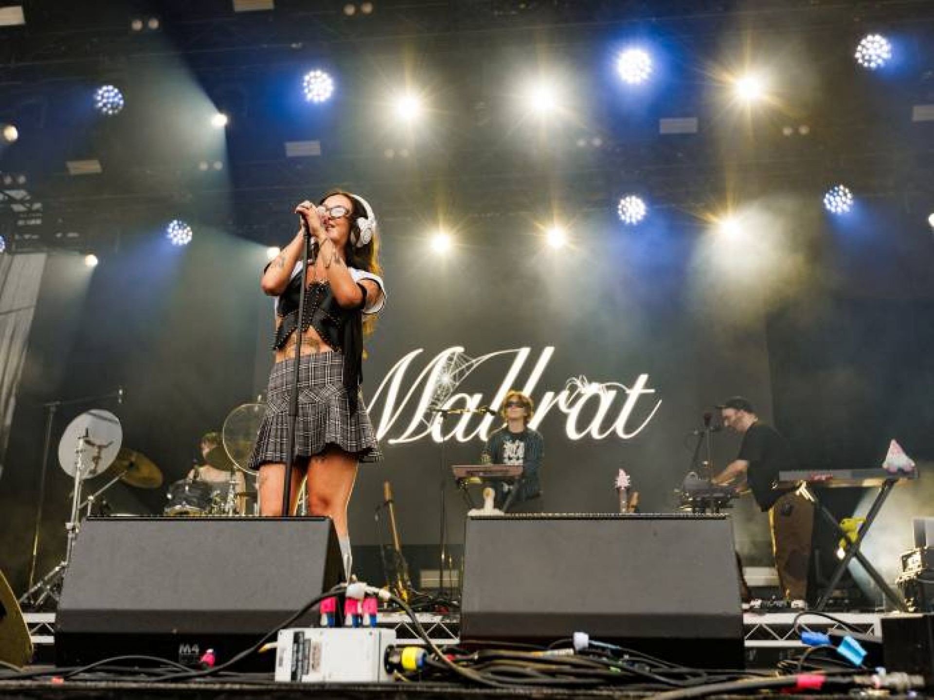 Singer and band on stage