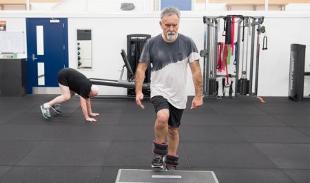 Man exercising indoors
