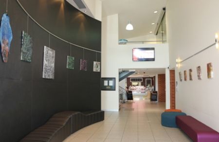 Foyer walls with art hung