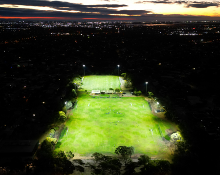 Aerial view of the sports field illuminated at night
