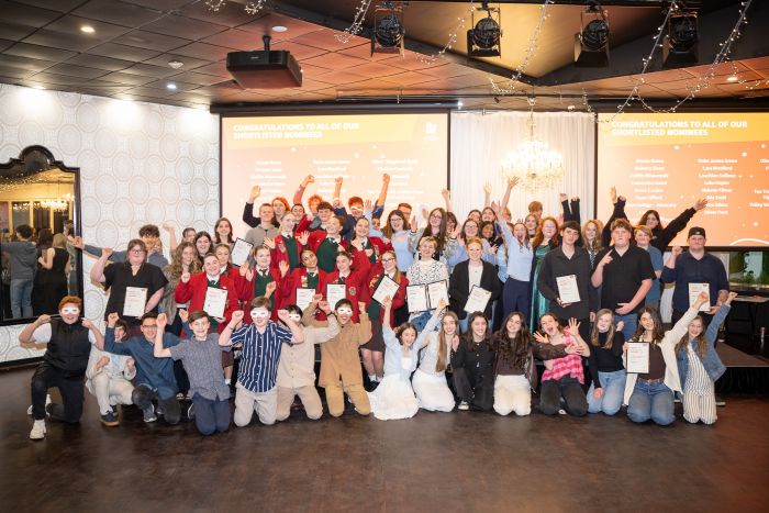 Group of young adults celebrating their achievements