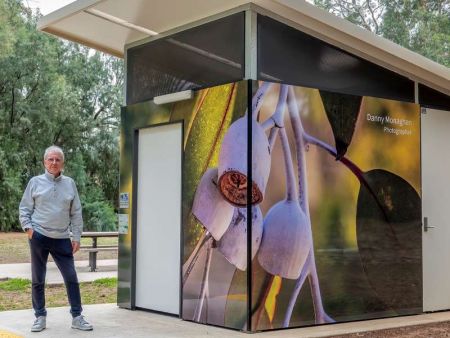 Toilet block wrapped in photo of flowers