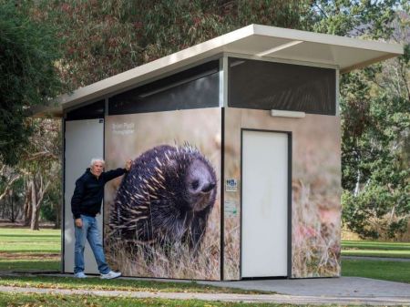  Toilet block wrapped in photo of echidna